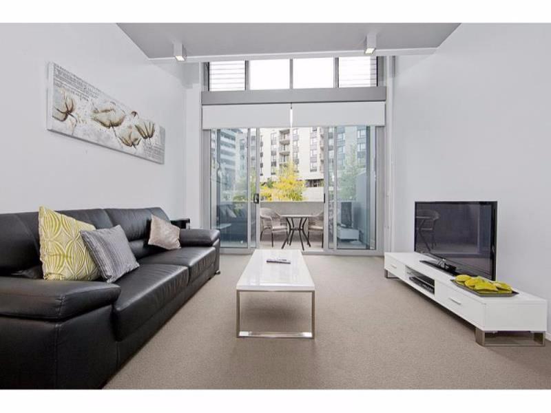 Hotel Realm Canberra Exterior foto Living room